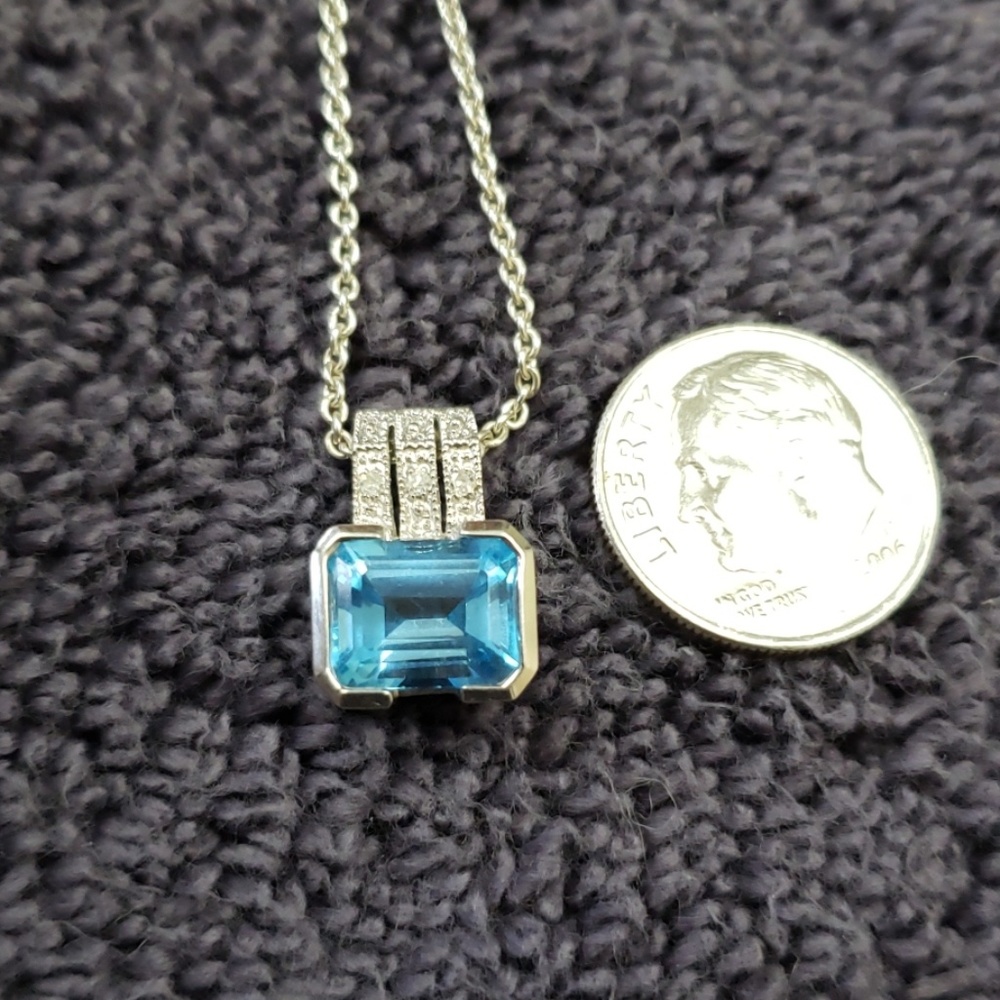 14k Blue Topaz pendant (chain not included)
